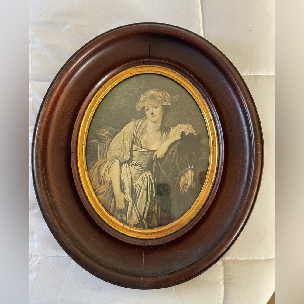 The Milk Maid Antique black and white lithograph in oval wood frame.